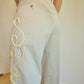 Pantalon vintage gris à motifs ornementales en laine brodés à la main au Québec par l’artiste et designer Caroline Auger