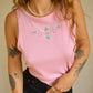 Camisole rose vintage avec motif de fleurs brodées à la main au Québec par l’artiste et designer Caroline Auger