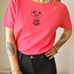 T-shirt rose balloune vintage à motif d’œil fleur old school brodé à la main au Québec par l’artiste Caroline Auger