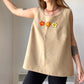 Camisole vintage beige à fleurs brodées à la main au Québec par l’artiste Caroline Auger 